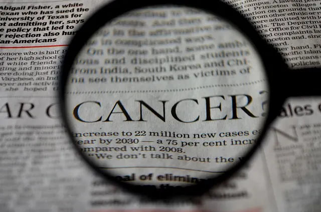 słowo cancer w gazecie
